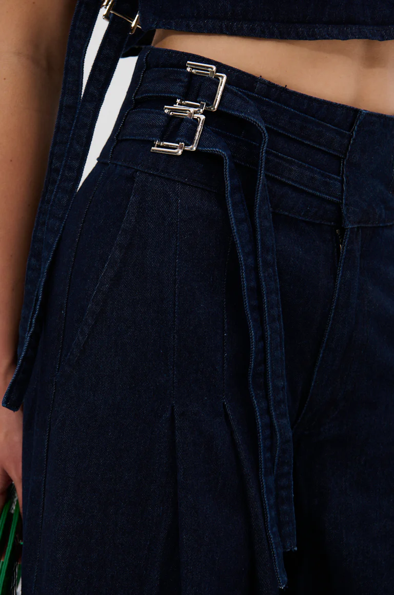 Snap-front sleeveless top + denim pants