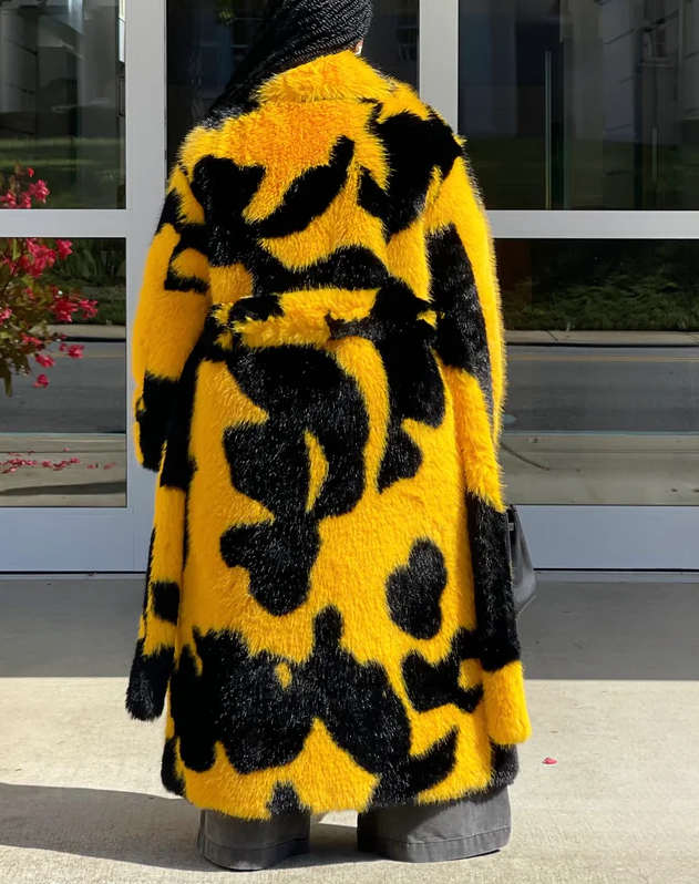 Spotted faux fur coat