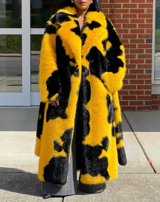 Spotted faux fur coat