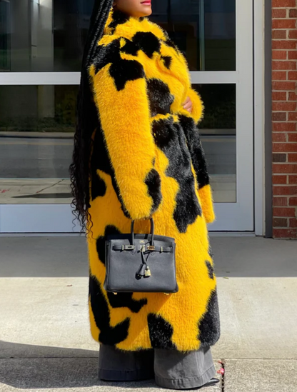 Spotted faux fur coat