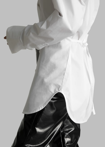 Waist-cinching padded shirt