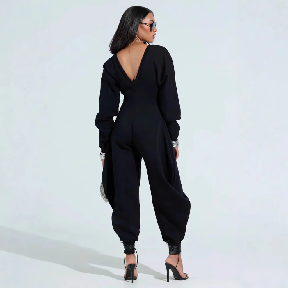 Flared jumpsuit with tight v-neck