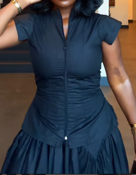 Front-buttoned black dress