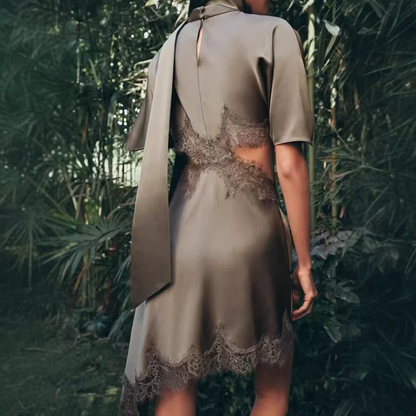 Silk satin dress with lace cutout design at the waist