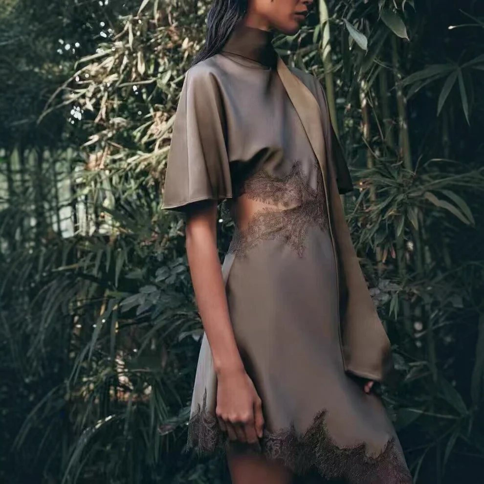 Silk satin dress with lace cutout design at the waist
