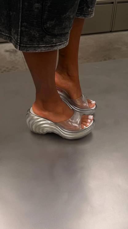 Open-toe platform shoes with wavy soles