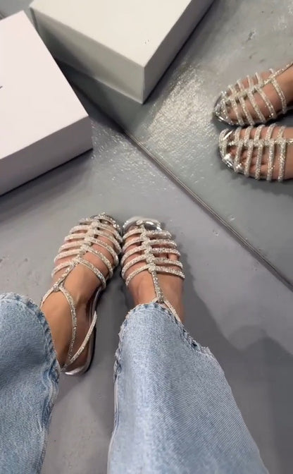 Diamond-studded toe-ring sandals