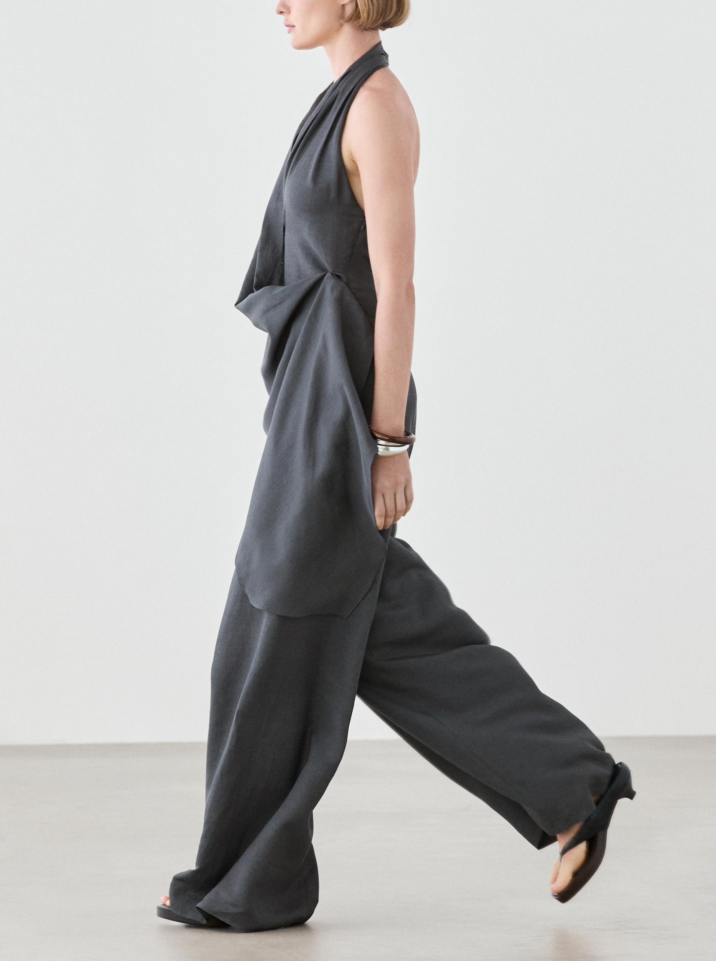 Asymmetric draped jumpsuit