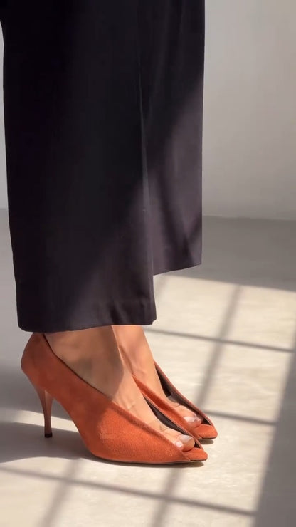 Asymmetrical high heels