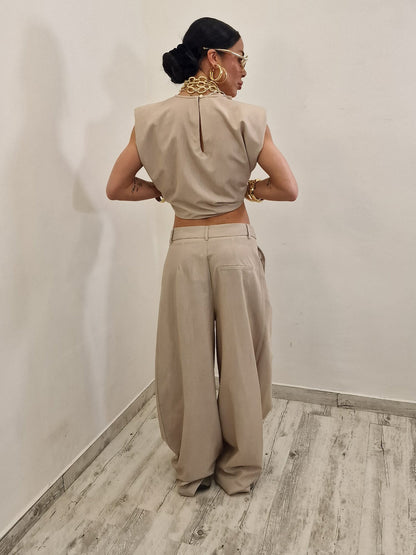 Sleeveless ruffled top + asymmetrical pants