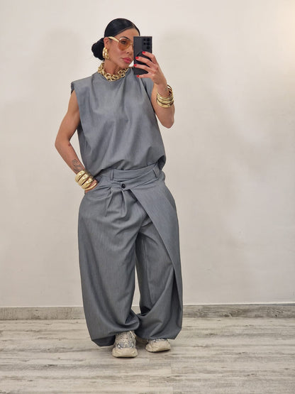 Sleeveless ruffled top + asymmetrical pants