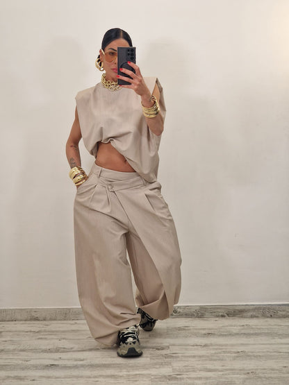 Sleeveless ruffled top + asymmetrical pants