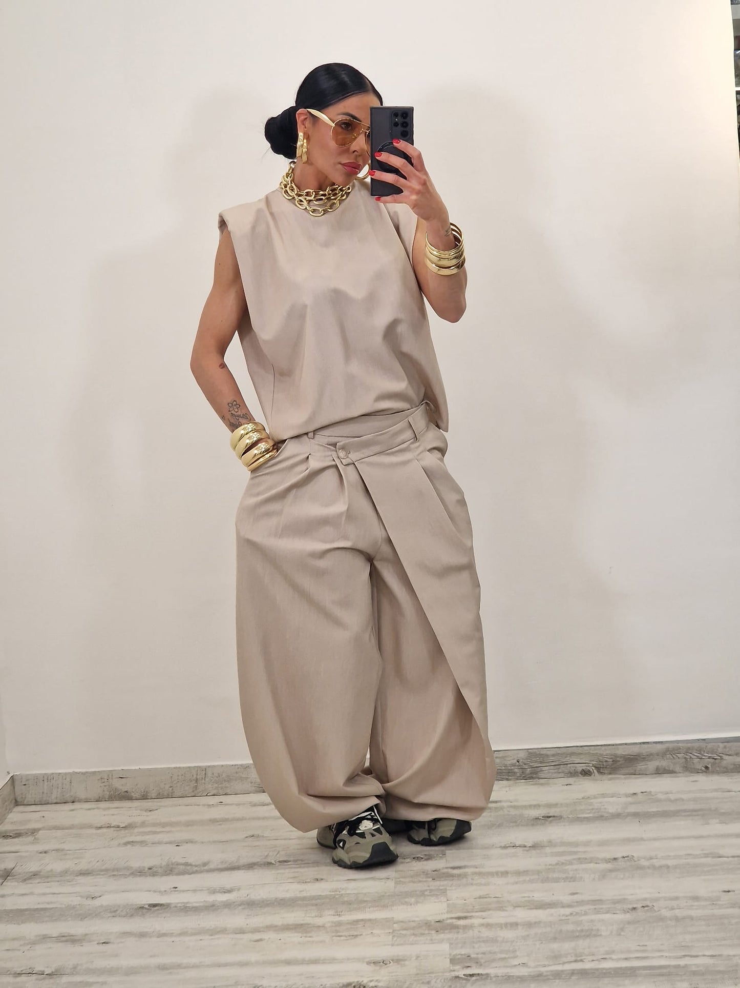 Sleeveless ruffled top + asymmetrical pants