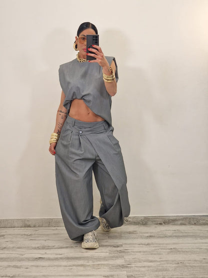 Sleeveless ruffled top + asymmetrical pants