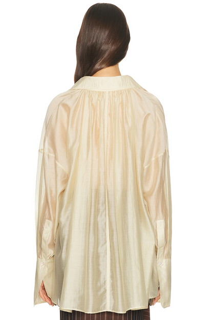 Stand-up collar shirt + pleated asymmetrical skirt