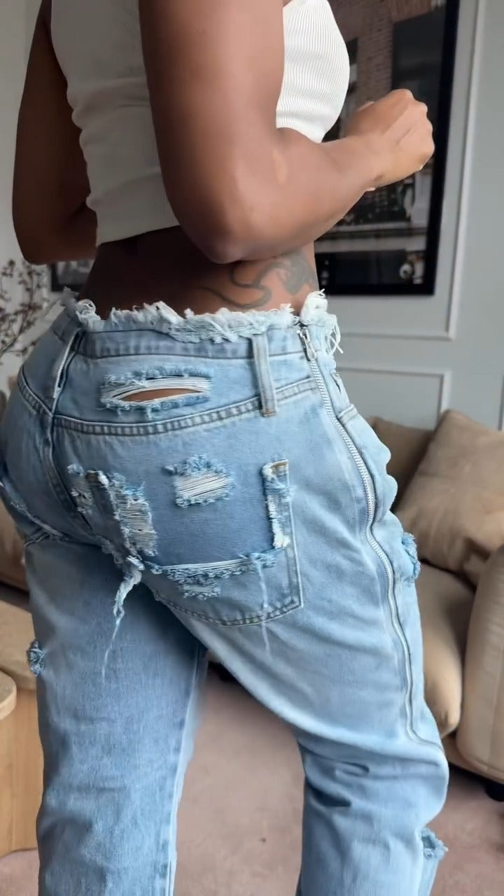 Low-rise loose distressed jeans