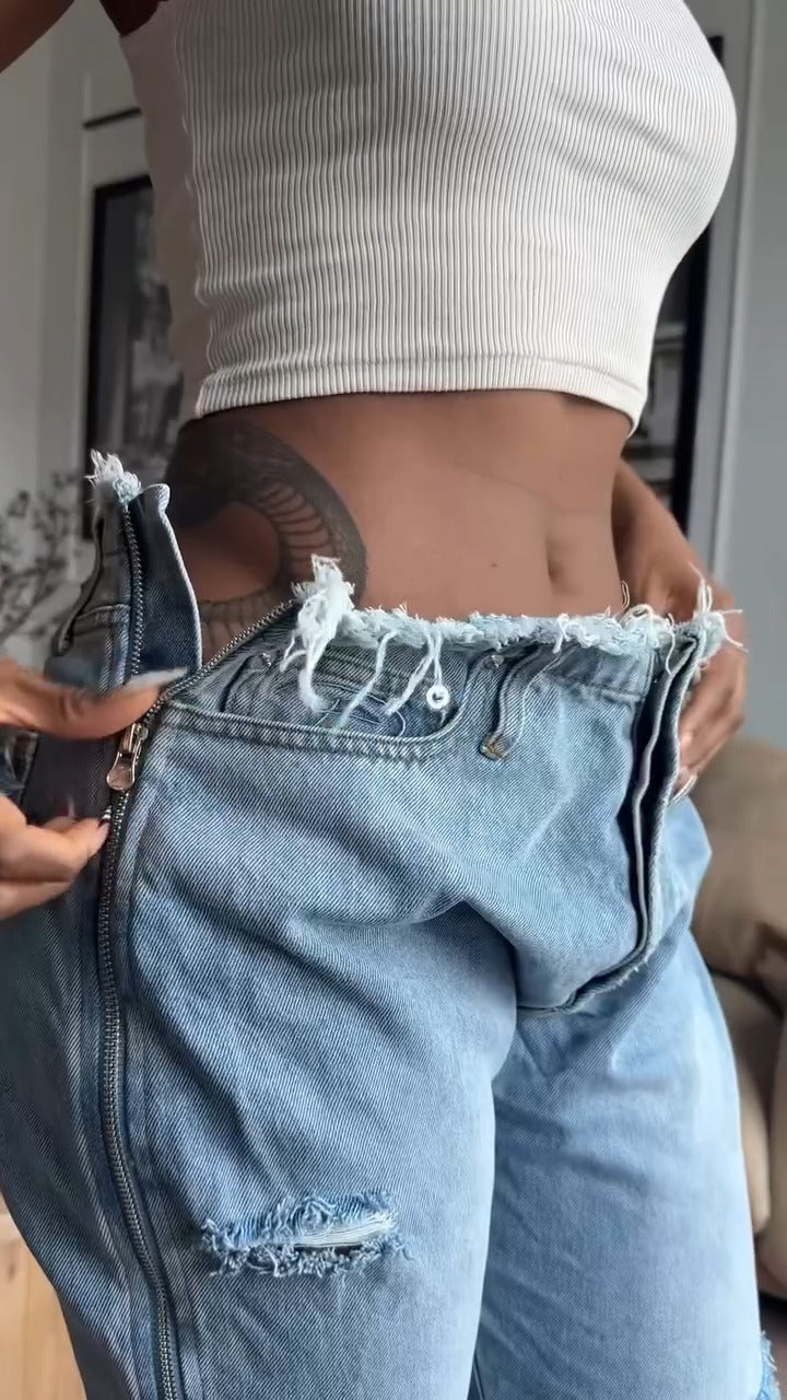 Low-rise loose distressed jeans