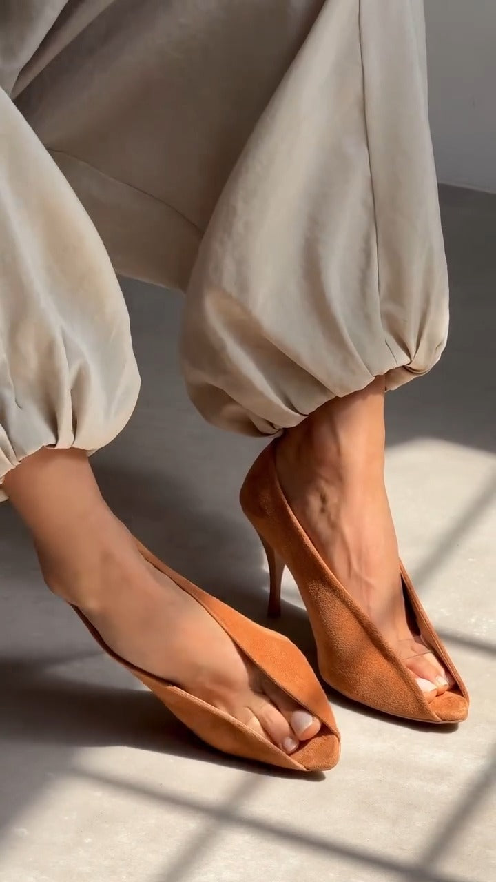 Asymmetrical high heels